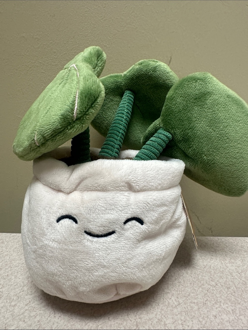 Giggle Scape Smiling Potted Plant Plush in White and Green